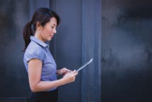 woman looking at tablet digital transformation